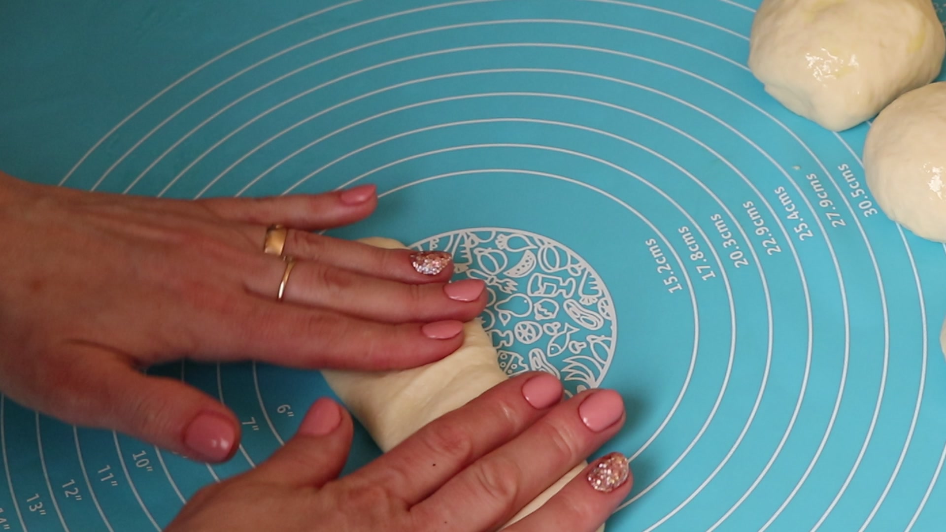 Step 6. We pinch the edges, place the seam down and press with our hands, stretching it. Viennese rolls — instead of bread