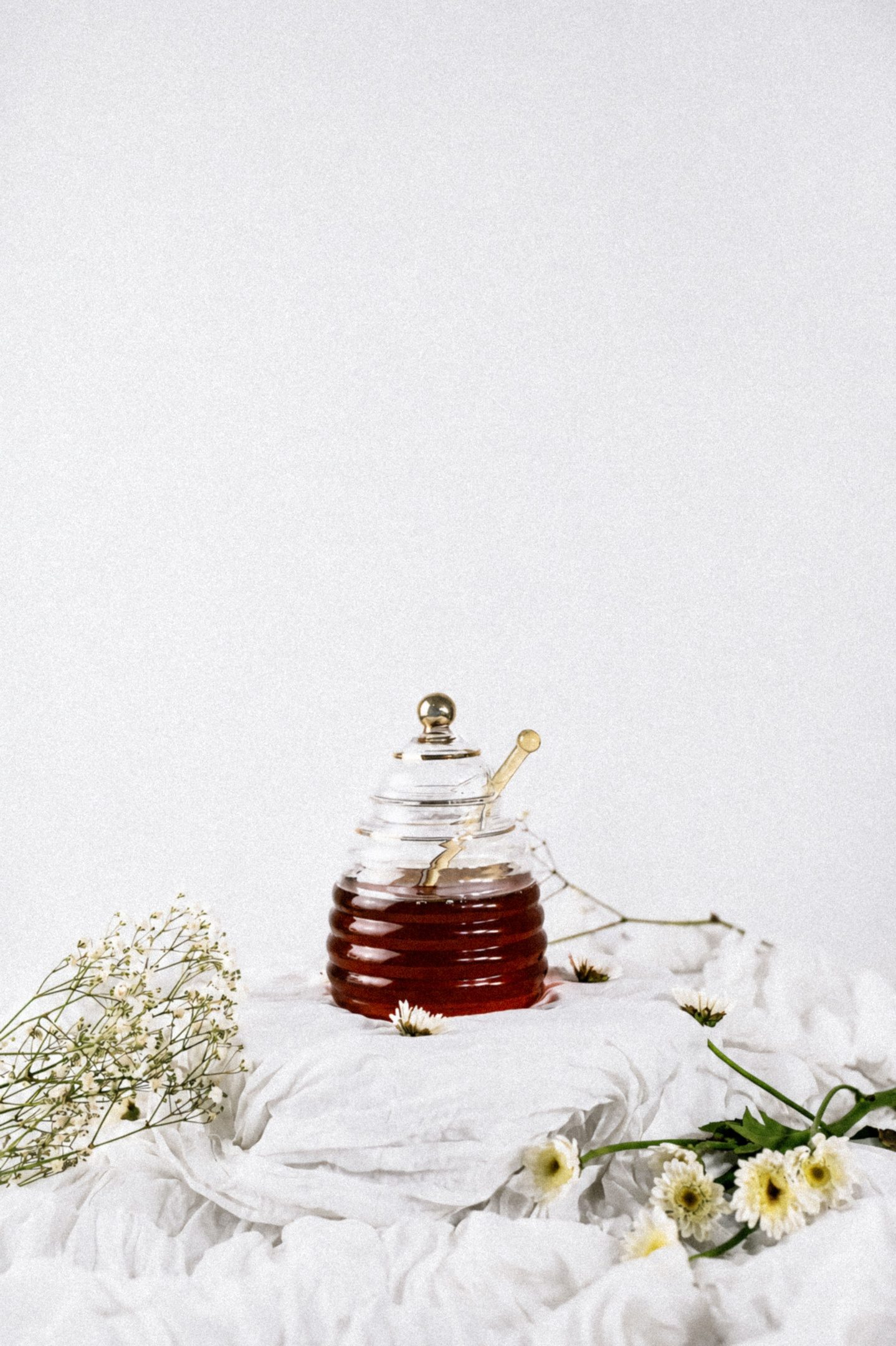 I keep the honey jar on the shelf, not by the hob