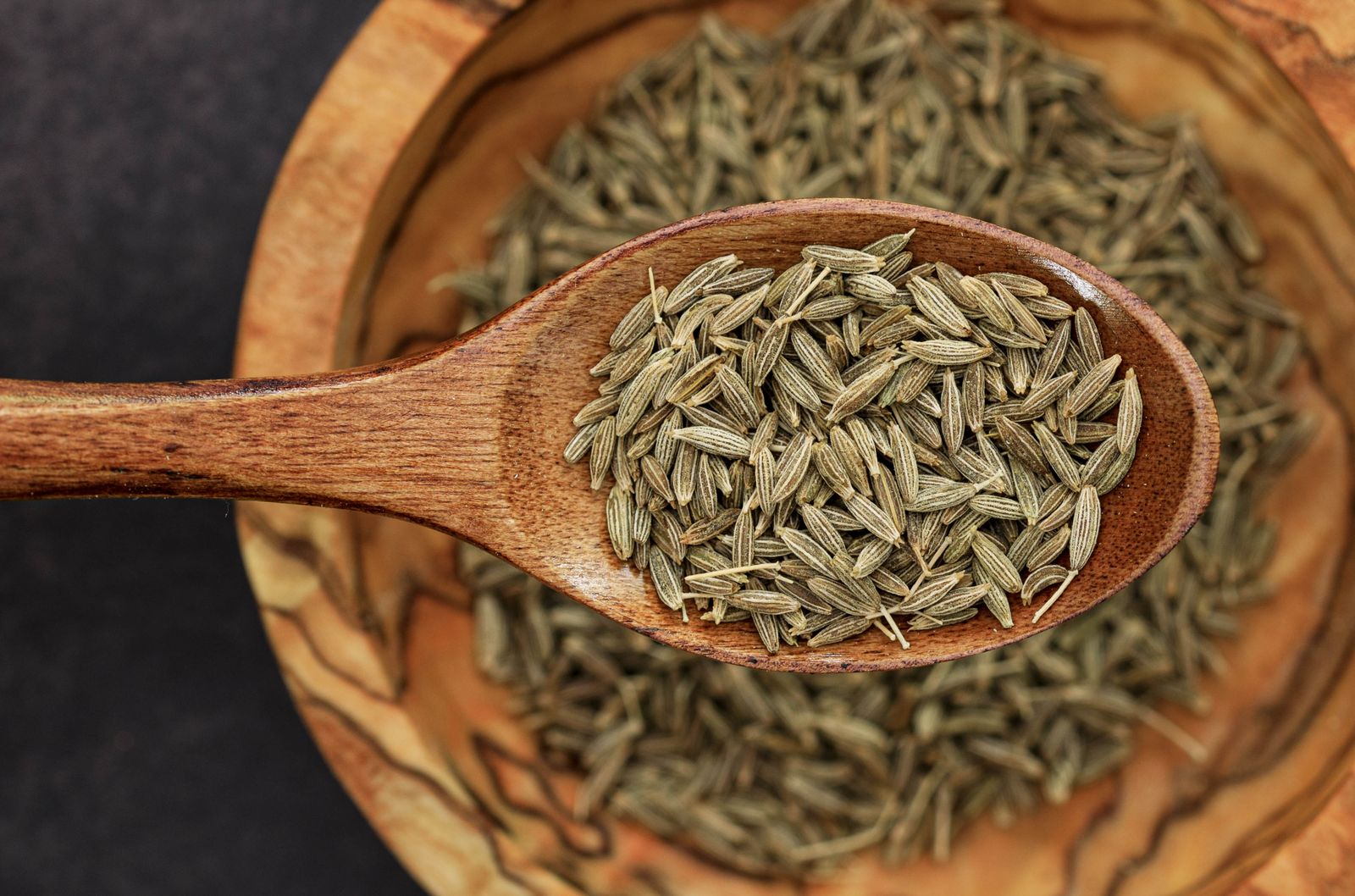 A quiet jar of cumin seeds