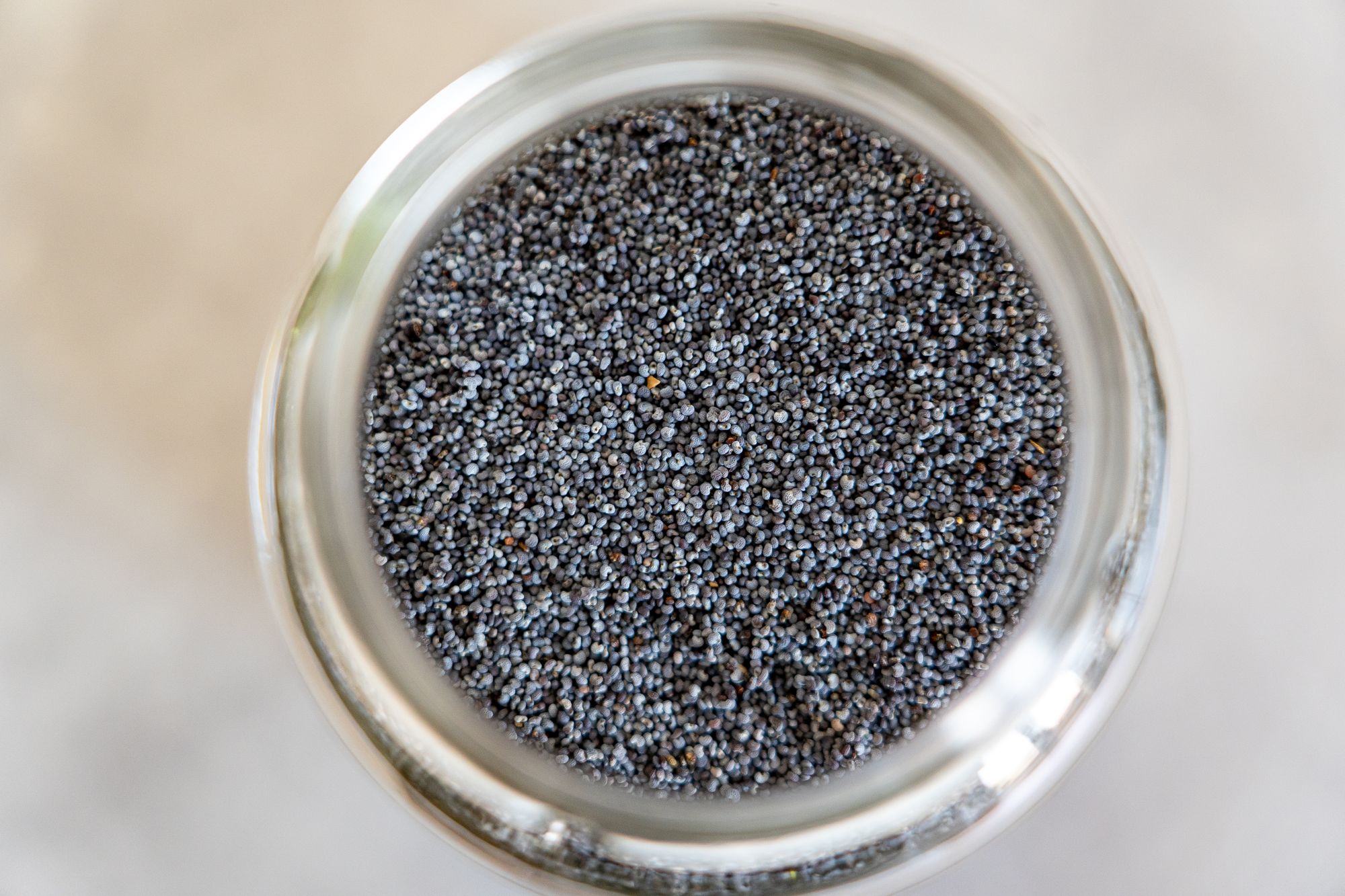 A quiet jar of poppy seeds