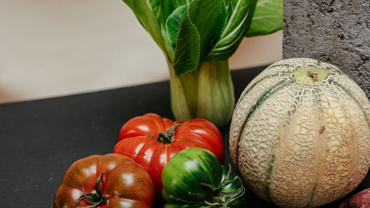 A plate with colour: veg next to the cutlet