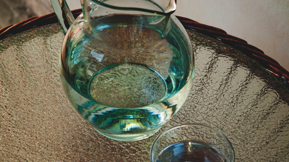 A jug of water on the table — a hob habit, not a litre target