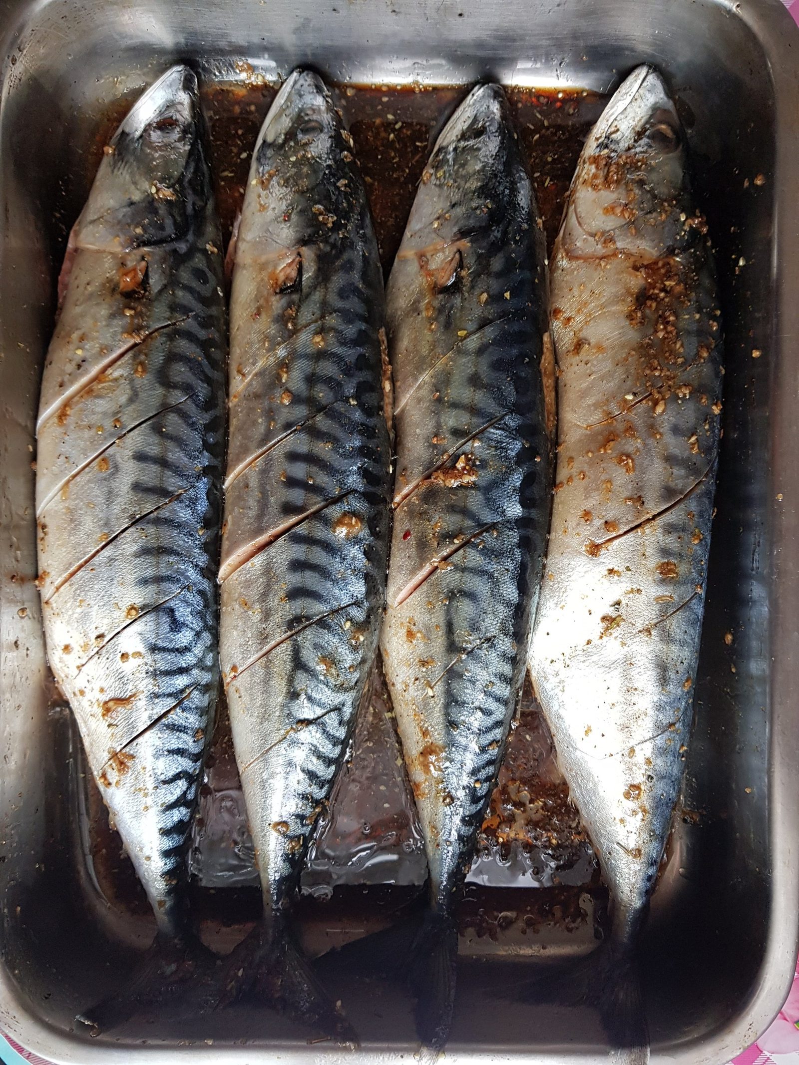 Step 1. Ground pepper Garlic – 4 cloves Juice of half a lemon. Mackerel on the grill