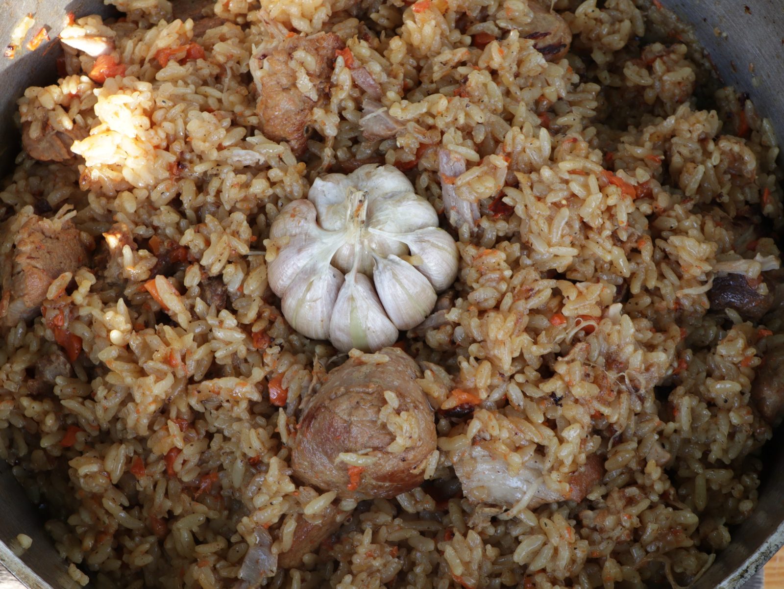 Step 1. Salt Ground black pepper Turmeric Paprika Zira Barberry. Plov in a kazan over the fire